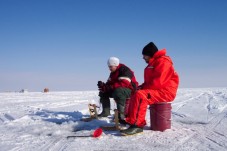 Winter fishing and snowshoe walking for two