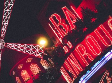 Stay in a sumptuous room inside the Moulin Rouge
